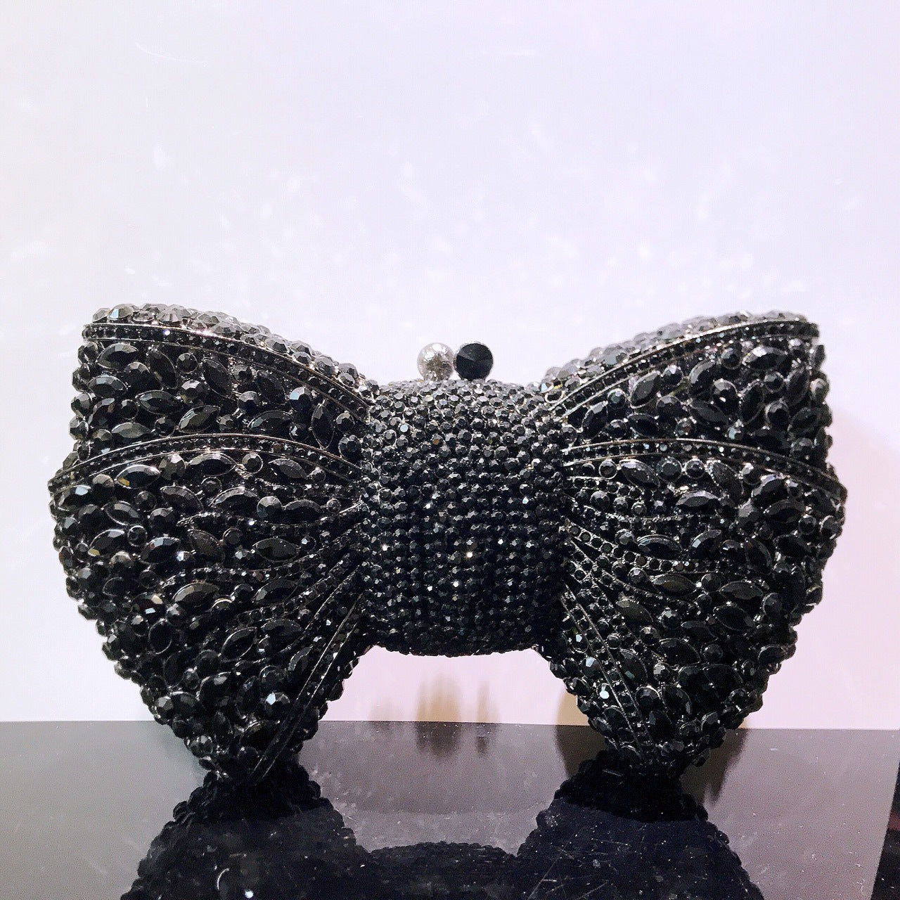 Bow-Embellished Crystal Clutch