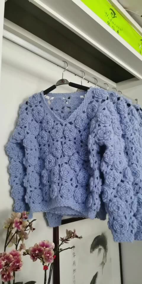 Hand-crocheted wool rose flower sweater